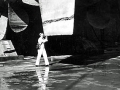 1098 Marv Fulton holding up the rudder.